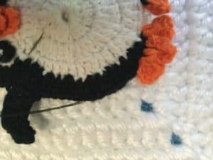 Attaching appliques to items sewing on penguin 3