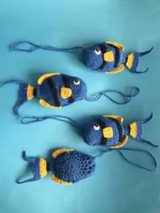 Finished crochet fish scrubbie group portrait
