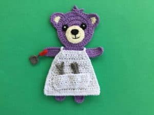 Finished crochet barbecue apron with teddy landscape
